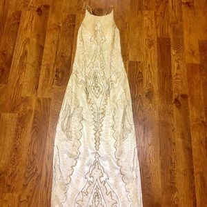 Beautiful beaded formal dress with open back